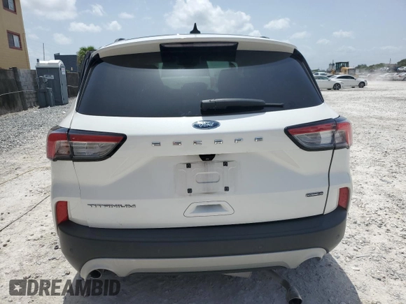2020 Ford Escape Titanium Hybrid with VIN 1FMCU9DZ0LUB95931, listed as a Copart auction lot 59876815 with 67,932 mi miles and Salvage title. Bid and sale history available at DreamBid. Image 6.