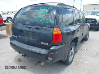 2005 GMC Envoy SLE with VIN 1GKDS13SX52373187, listed as a IAAI auction lot 42434190 with 112,965 mi miles and . Bid and sale history available at DreamBid. Image 4.