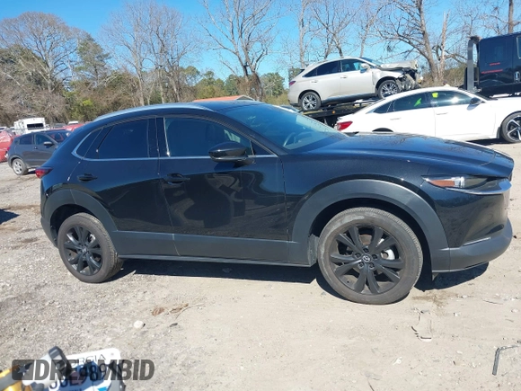 2022 Mazda CX-30 2.5 Turbo Premium Package with VIN 3MVDMBDY4NM446866, listed as a IAAI auction lot 41704578 with 24,360 mi miles. Bid and sale history available at carsss.com. Image 14.