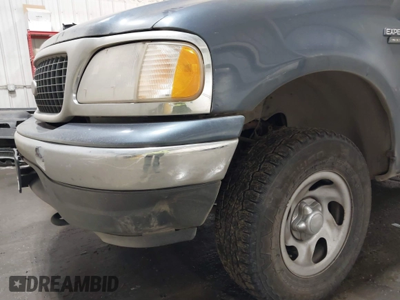 2000 Ford Expedition XLT with VIN 1FMRU1668YLB76006, listed as a IAAI auction lot 41621842 with 153,040 mi miles and . Bid and sale history available at DreamBid. Image 6.