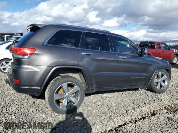 2015 Jeep Grand Cherokee Overland with VIN 1C4RJFCT4FC118184, listed as a Copart auction lot 44465045 with 143,149 mi miles and Salvage Title. Bid and sale history available at carsss.com. Image 3.