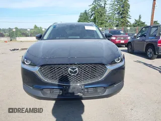 2023 Mazda CX-30 S Select with VIN 3MVDMBBM4PM558831, listed as a IAAI auction lot 42432750 with 12,468 mi miles and . Bid and sale history available at DreamBid. Image 13.