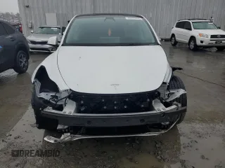 2023 Tesla Model Y Long Range z VIN 7SAYGDEE1PA114563, wystawiony jako Copart lot #44423505 z przebiegiem Nie podano mil oraz Szkody całkowita. Historia ofert i sprzedaży dostępna na DreamBid. Obrazek 5.