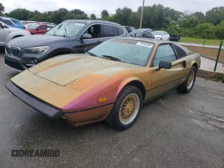 1988 Pontiac Fiero z VIN 1G2PE1192JP216710, wystawiony jako Copart lot #73746484 z przebiegiem Nie podano mil oraz Szkoda całkowita • Salvage title. Historia ofert i sprzedaży dostępna na DreamBid. Obrazek 1.