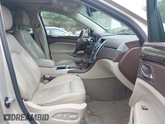 2011 Cadillac SRX Luxury Collection with VIN 3GYFNAEY4BS663447, listed as a IAAI auction lot 42134933 with 153,411 mi miles and . Bid and sale history available at DreamBid. Image 5.
