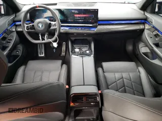 2024 BMW i5 M60 z VIN WBY43FK03RCP92888, wystawiony jako Copart lot #76619994 z przebiegiem 10 829 mil mil oraz Szkody całkowita. Historia ofert i sprzedaży dostępna na DreamBid. Obrazek 8.