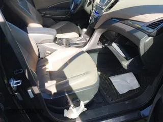2013 Hyundai Santa Fe Sport z VIN 5XYZU3LA7DG087980, wystawiony jako IAAI lot #42324342 z przebiegiem 160 941 mil mil oraz . Historia ofert i sprzedaży dostępna na DreamBid. Obrazek 5.