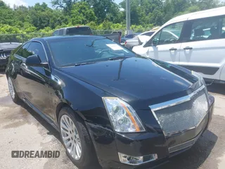2012 Cadillac CTS Performance z VIN 1G6DJ1E31C0139231, wystawiony jako IAAI lot #42446853 z przebiegiem 102 857 mil mil oraz . Historia ofert i sprzedaży dostępna na DreamBid. Obrazek 1.