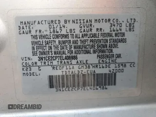 2014 Nissan Note SV with VIN 3N1CE2CP7EL406986, listed as a Copart auction lot 52984175 with 128,727 mi miles and Salvage Title. Bid and sale history available at DreamBid. Image 12.