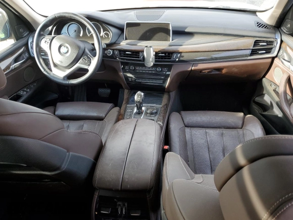 2015 BMW X5 xDrive35i with VIN 5UXKR0C52F0K52569, listed as a Copart auction lot 76691114 with 150,286 mi miles and Salvage Title. Bid and sale history available at carsss.com. Image 8.