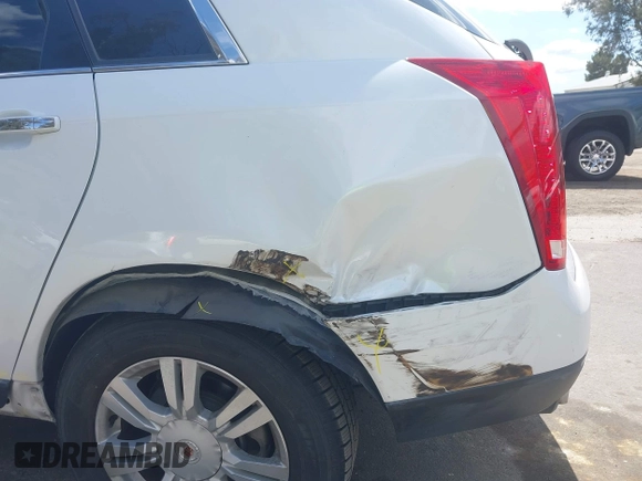 2015 Cadillac SRX Luxury Collection with VIN 3GYFNBE38FS584296, listed as a IAAI auction lot 41950092 with 56,691 mi miles and . Bid and sale history available at carsss.com. Image 12.