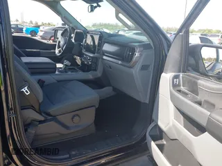 2024 Ford F-150 Lightning XLT with VIN 1FTVW3LK8RWG20320, listed as a IAAI auction lot 41960103 with Not provided miles and . Bid and sale history available at DreamBid. Image 5.