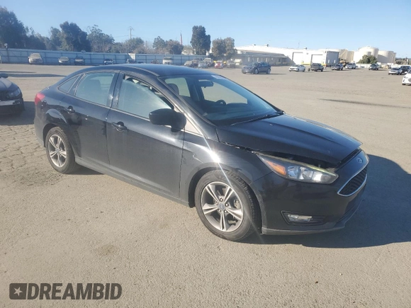 2018 Ford Focus SE with VIN 1FADP3F21JL288026, listed as a Copart auction lot 46908205 with 70,739 mi miles and Salvage Title. Bid and sale history available at carsss.com. Image 4.