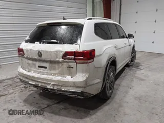 2019 Volkswagen Atlas SE z VIN 1V2XR2CA0KC595596, wystawiony jako IAAI lot #41410019 z przebiegiem 103 336 mil mil oraz . Historia ofert i sprzedaży dostępna na DreamBid. Obrazek 4.