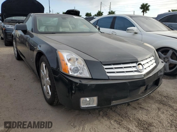2005 Cadillac XLR z VIN 1G6YV34A955600425, wystawiony jako Copart lot #76188034 z przebiegiem Nie podano mil oraz Szkody całkowita. Historia ofert i sprzedaży dostępna na DreamBid. Obrazek 4.