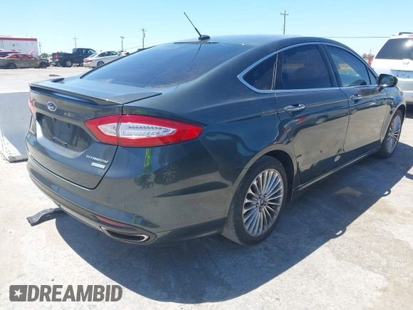 2016 Ford Fusion Titanium with VIN 3FA6P0K98GR196951, listed as a IAAI auction lot 42538508 with 186,298 mi miles and . Bid and sale history available at DreamBid. Image 4.