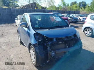 2012 Scion iQ with VIN JTNJJXB05CJ021301, listed as a IAAI auction lot 42323450 with 97,185 mi miles and . Bid and sale history available at DreamBid. Image 13.