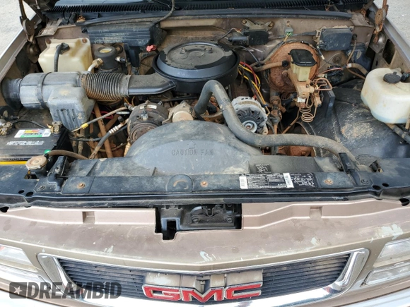 1994 GMC Sierra 1500 z VIN 2GTEK19K3R1574913, wystawiony jako Copart lot #55939635 z przebiegiem 191 240 mil mil oraz Szkoda całkowita • Salvage title. Historia ofert i sprzedaży dostępna na DreamBid. Obrazek 11.