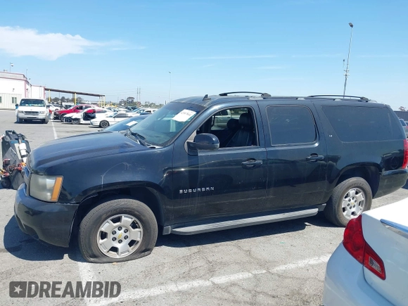 2011 Chevrolet Suburban LT with VIN 1GNSCJE0XBR285973, listed as a IAAI auction lot 42007844 with 252,994 mi miles. Bid and sale history available at carsss.com. Image 14.