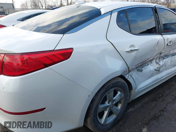 2015 Kia Optima LX with VIN KNAGM4A75F5644401, listed as a IAAI auction lot 41672679 with 217,636 mi miles. Bid and sale history available at carsss.com. Image 6.