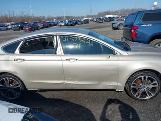 2017 Ford Fusion Titanium with VIN 3FA6P0K91HR309740, listed as a IAAI auction lot 41373824 with 95,499 mi miles and . Bid and sale history available at DreamBid. Image 14.