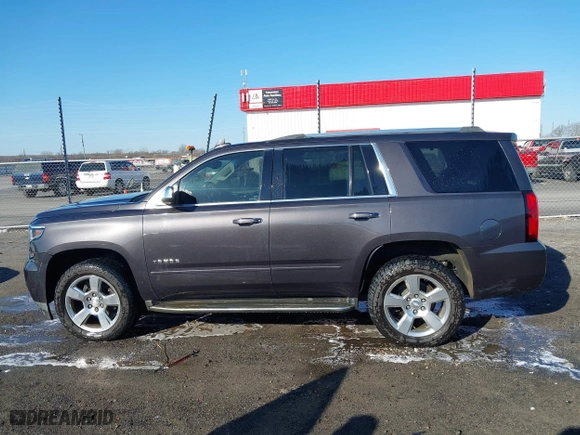 2018 Chevrolet Tahoe Premier with VIN 1GNSCCKC5JR204676, listed as a IAAI auction lot 41731192 with 130,528 mi miles. Bid and sale history available at carsss.com. Image 14.