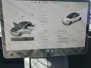 2021 Tesla Model 3 Long Range z VIN 5YJ3E1EB2MF007067, wystawiony jako Copart lot #52584715 z przebiegiem 31 311 mil mil oraz Szkoda całkowita • Salvage title. Historia ofert i sprzedaży dostępna na DreamBid. Obrazek 9.