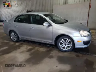 2009 Volkswagen Jetta z VIN 3VWAL71KX9M072304, wystawiony jako Copart lot #57027785 z przebiegiem 191 554 mil mil oraz Szkoda całkowita • Salvage title. Historia ofert i sprzedaży dostępna na DreamBid. Obrazek 4.