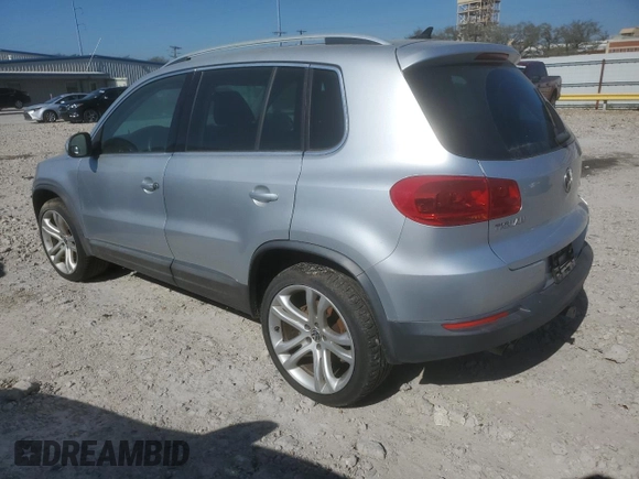 2012 Volkswagen Tiguan S with VIN WVGBV7AX5CW601352, listed as a Copart auction lot 48768155 with 161,632 mi miles and Salvage Title. Bid and sale history available at DreamBid. Image 2.