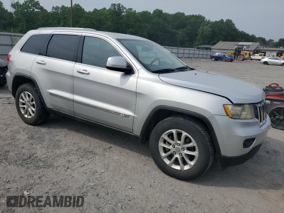 2011 Jeep Grand Cherokee Laredo with VIN 1J4RR4GG3BC581321, listed as a Copart auction lot 60893935 with 216,137 mi miles and Clean title. Bid and sale history available at DreamBid. Image 4.