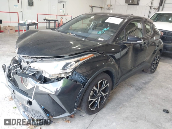 2020 Toyota C-HR LE with VIN JTNKHMBX1L1077957, listed as a IAAI auction lot 42159765 with 83,138 mi miles and . Bid and sale history available at DreamBid. Image 18.