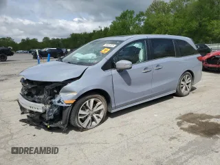 2023 Honda Odyssey Touring с VIN 5FNRL6H80PB057256, выставлен на аукционе Copart как лот 55897825 с пробегом 27 615 миль миль и Списание • Salvage title. История ставок и продаж доступна на DreamBid. Изображение 1.
