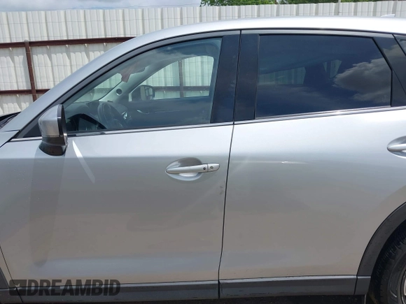 2018 Mazda CX-5 Grand Touring with VIN JM3KFADM6J0339185, listed as a IAAI auction lot 42160763 with 86,312 mi miles and . Bid and sale history available at DreamBid. Image 14.