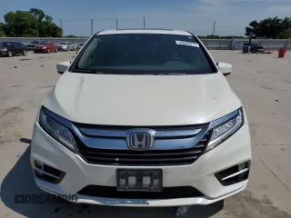 2019 Honda Odyssey Touring with VIN 5FNRL6H86KB089055, listed as a Copart auction lot 56980975 with 154,842 mi miles and Salvage title. Bid and sale history available at DreamBid. Image 5.