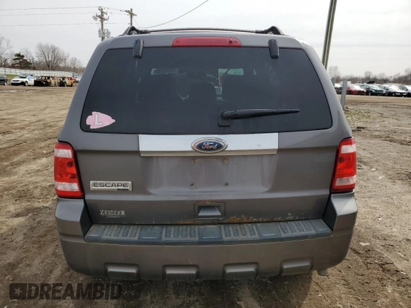 2010 Ford Escape Limited z VIN 1FMCU9E7XAKB63865, wystawiony jako Copart lot #51208285 z przebiegiem 177 517 mil mil oraz Czysty tytuł • Clean title. Historia ofert i sprzedaży dostępna na DreamBid. Obrazek 6.