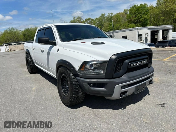 2016 Ram 1500 Rebel z VIN 1C6RR7YT9GS260844, wystawiony jako Copart lot #57285075 z przebiegiem 134 704 mil mil oraz Tytuł czysty. Historia ofert i sprzedaży dostępna na DreamBid. Obrazek 4.