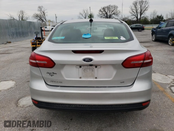2017 Ford Focus SE with VIN 1FADP3F21HL267350, listed as a Copart auction lot 52897605 with 156,345 mi miles and Salvage title. Bid and sale history available at DreamBid. Image 6.