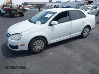 2010 Volkswagen Jetta Sedan S with VIN 3VWJZ7AJ9AM037277, listed as a IAAI auction lot 42044404 with 129,823 mi miles. Bid and sale history available at carsss.com. Image 2.