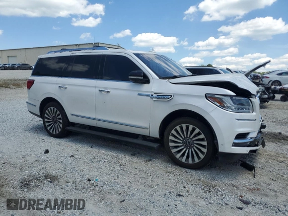 2019 Lincoln Navigator Reserve z VIN 5LMJJ2LT9KEL19544, wystawiony jako Copart lot #52240315 z przebiegiem 74 144 mil mil oraz Szkoda całkowita • Salvage title. Historia ofert i sprzedaży dostępna na DreamBid. Obrazek 4.
