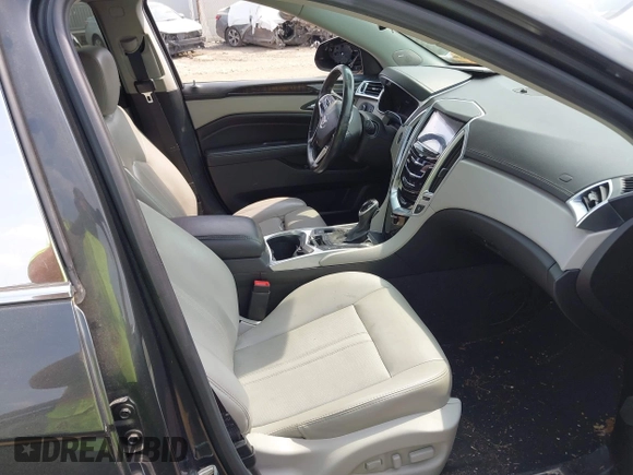 2016 Cadillac SRX Luxury Collection with VIN 3GYFNBE33GS553426, listed as a IAAI auction lot 42416200 with 118,256 mi miles and . Bid and sale history available at DreamBid. Image 5.