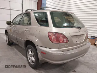 1999 Lexus RX 300 with VIN JT6HF10U1X0013464, listed as a IAAI auction lot 42088616 with 254,653 mi miles and . Bid and sale history available at DreamBid. Image 3.