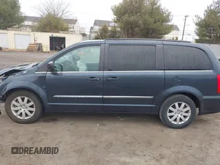 2014 Chrysler Town & Country Touring with VIN 2C4RC1BG6ER348090, listed as a IAAI auction lot 41687678 with 140,192 mi miles. Bid and sale history available at carsss.com. Image 14.