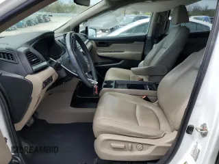 2020 Honda Odyssey Touring with VIN 5FNRL6H8XLB019365, listed as a Copart auction lot 52404335 with 59,486 mi miles and Salvage Title. Bid and sale history available at DreamBid. Image 7.