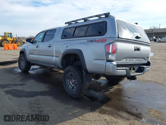 2021 Toyota Tacoma 4WD SR5 with VIN 3TMDZ5BN1MM105694, listed as a IAAI auction lot 41233853 with 1 mi miles. Bid and sale history available at carsss.com. Image 3.
