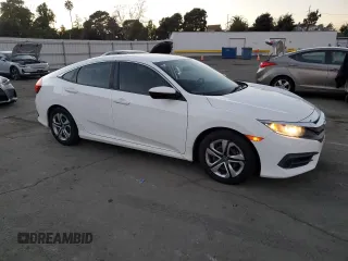2017 Honda Civic LX with VIN 19XFC2F58HE021715, listed as a Copart auction lot 88125025 with 86,058 mi miles and Salvage Title. Bid and sale history available at DreamBid. Image 4.