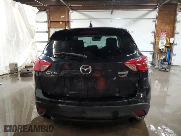 2015 Mazda CX-5 Touring with VIN JM3KE4CY1F0458911, listed as a Copart auction lot 87666255 with 0 mi miles and Salvage Title. Bid and sale history available at carsss.com. Image 6.