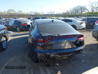 2021 Kia Stinger GT with VIN KNAE35LC4M6097199, listed as a IAAI auction lot 41884424 with 61,490 mi miles. Bid and sale history available at carsss.com. Image 6.