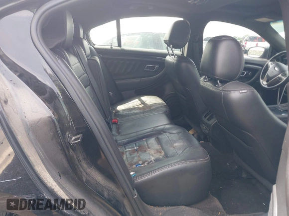 2013 Ford Taurus SHO с VIN 1FAHP2KT9DG144215, выставлен на аукционе IAAI как лот 42107386 с пробегом 199 934 миль миль и . История ставок и продаж доступна на DreamBid. Изображение 8.