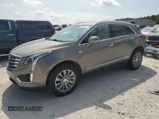 2018 Cadillac XT5 Luxury AWD with VIN 1GYKNDRS6JZ166679, listed as a Copart auction lot 60924685 with 99,670 mi miles and Clean title. Bid and sale history available at DreamBid. Image 1.