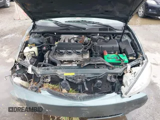 2002 Toyota Camry XLE z VIN 4T1BF32K02U522335, wystawiony jako IAAI lot #42037459 z przebiegiem 214 832 mil mil oraz . Historia ofert i sprzedaży dostępna na DreamBid. Obrazek 10.